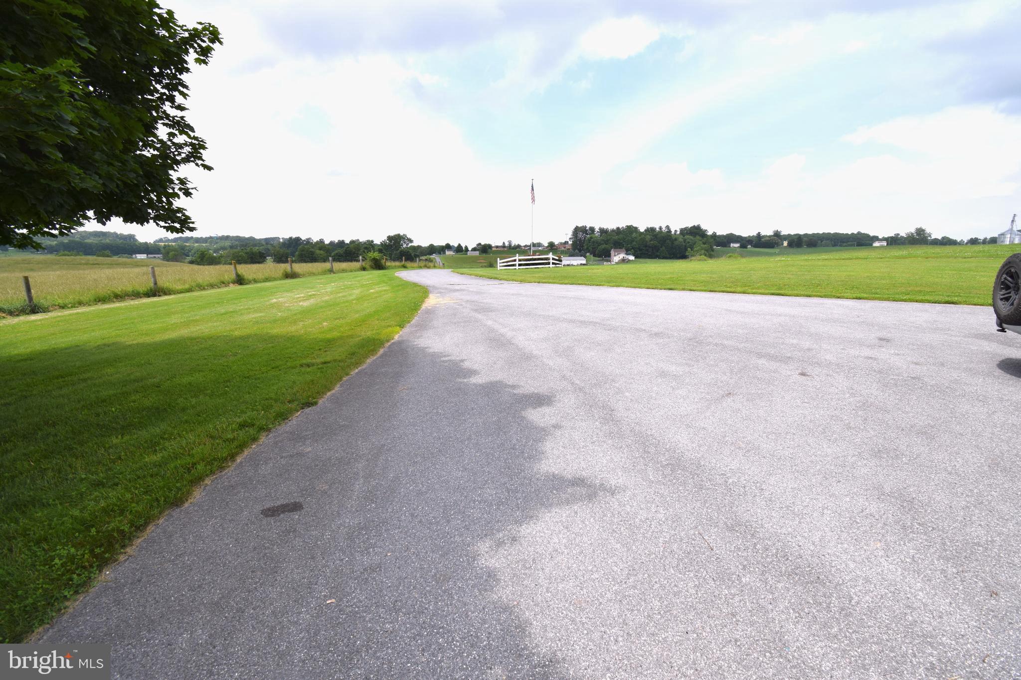 3875 Bark Hill Road Union Bridge, MD 21791 - Photo 139 of 142 a view of a park with large trees with wooden fence