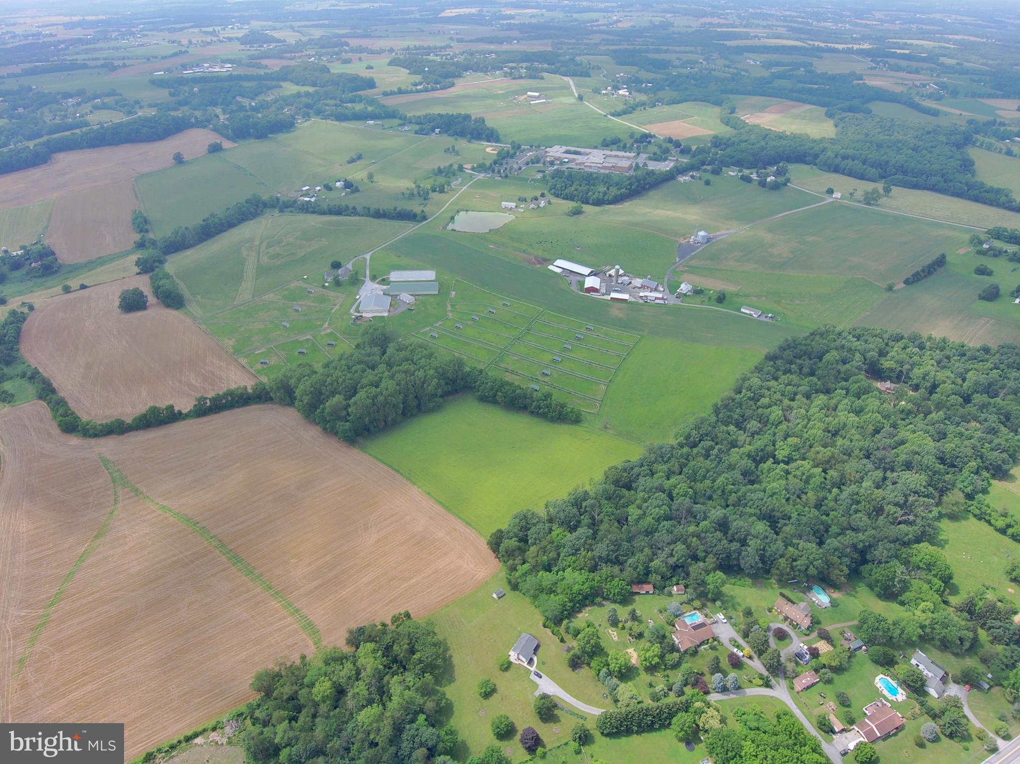 3875 Bark Hill Road Union Bridge, MD 21791 - Photo 41 of 142 an aerial view of residential houses with outdoor space and lake view