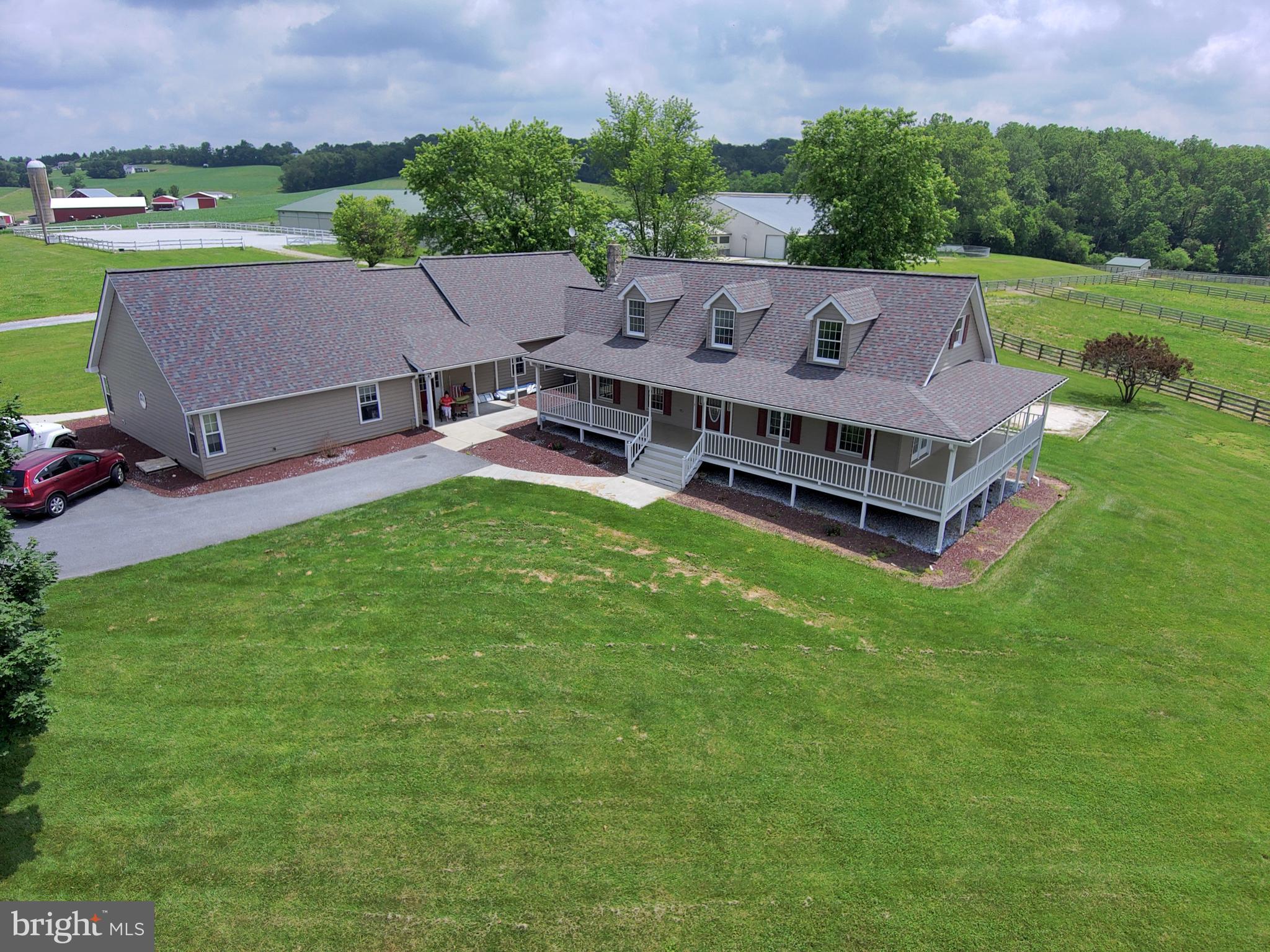 3875 Bark Hill Road Union Bridge, MD 21791 - Photo 8 of 142 an aerial view of a house with pool garden and mountain view in back