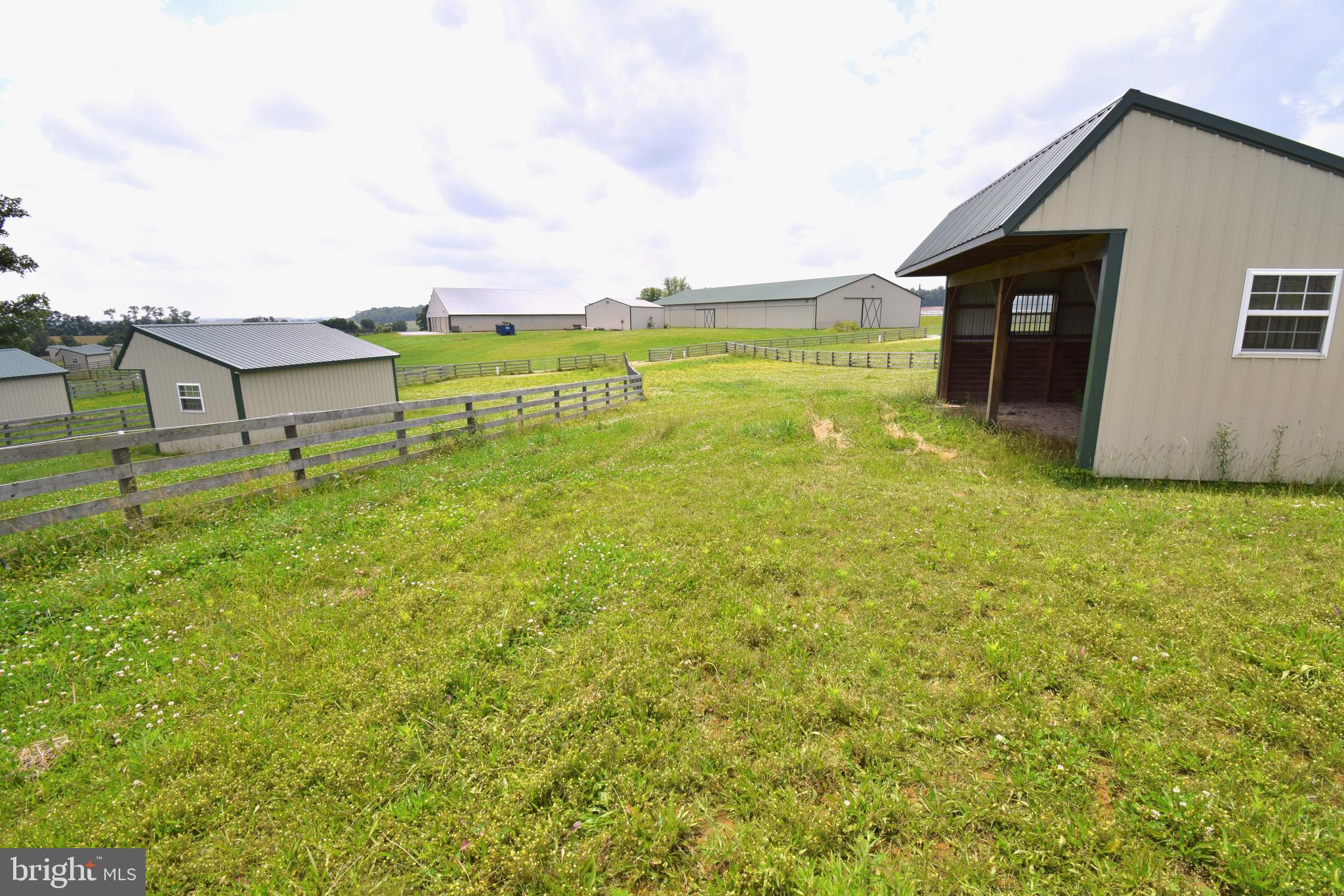 3875 Bark Hill Road Union Bridge, MD 21791 - Photo 84 of 142 a view of a big house with a big yard and large tree