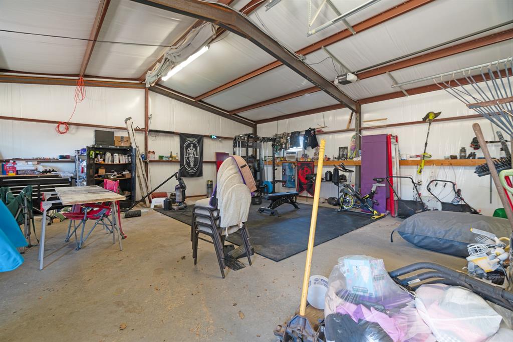 420 39th Street Southeast Paris, TX 75462 - Photo 25 of 25 a view of a garage with table and chairs