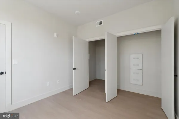 an empty room with closet