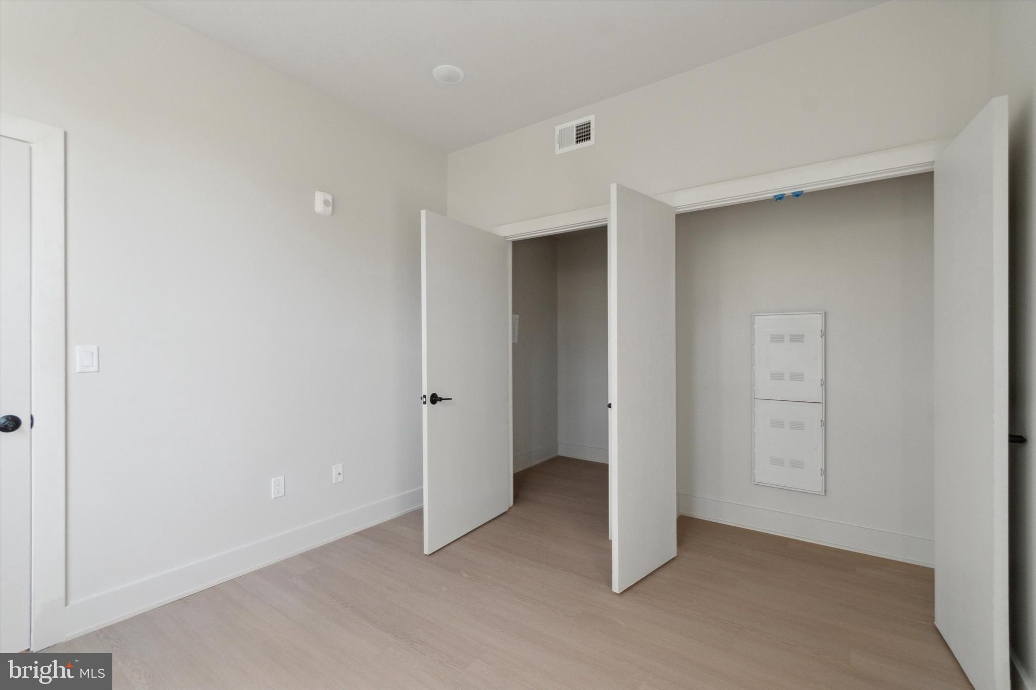 5521 Wayne Avenue, Unit 207 Philadelphia, PA 19144 - Photo 6 of 16 an empty room with closet