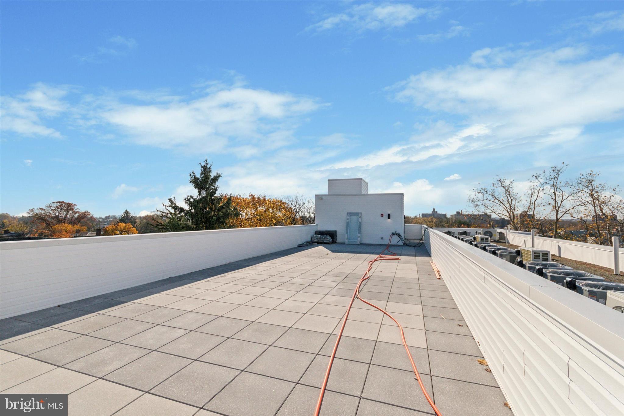 5521 Wayne Avenue, Unit 207 Philadelphia, PA 19144 - Photo 9 of 16 a view of terrace with city view