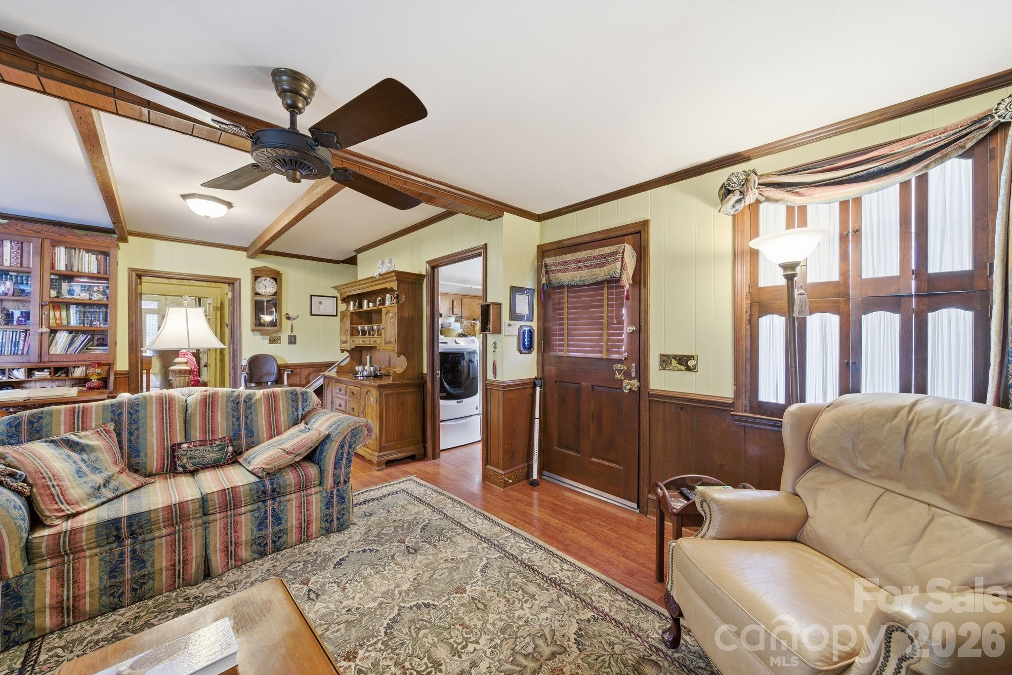 515 Camden Road Wadesboro, NC 28170 - Photo 16 of 36 a living room with furniture ceiling fan and a rug