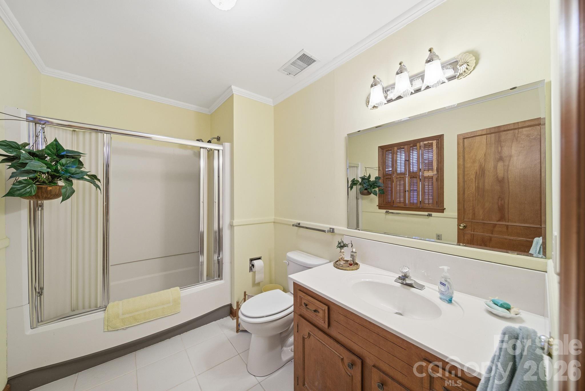 515 Camden Road Wadesboro, NC 28170 - Photo 27 of 36 a bathroom with a sink a toilet and shower