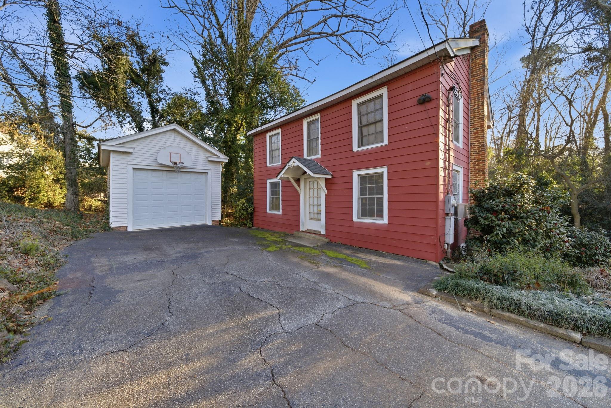 515 Camden Road Wadesboro, NC 28170 - Photo 33 of 36 a view of a house with a yard and large tree