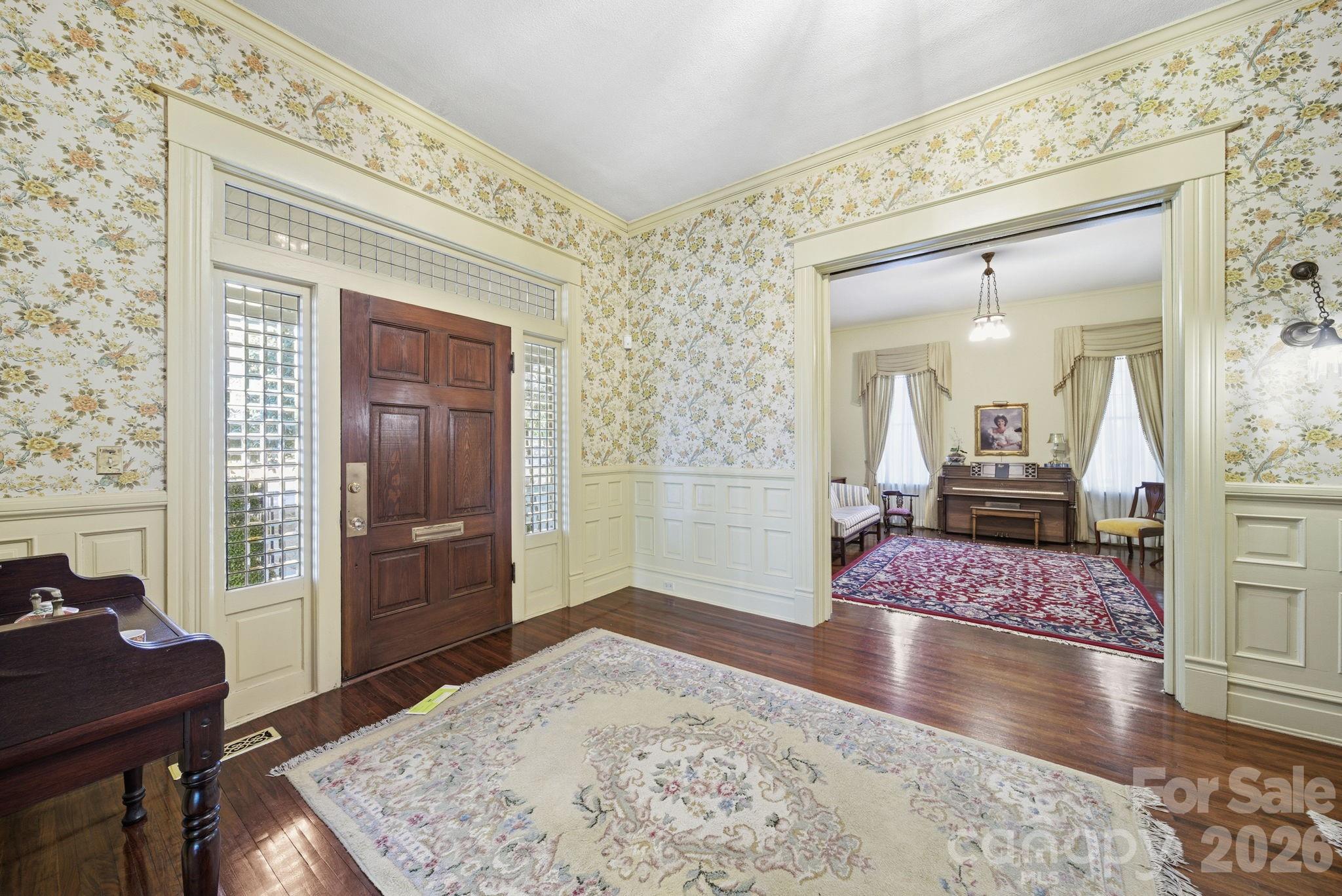 515 Camden Road Wadesboro, NC 28170 - Photo 5 of 36 a view of a livingroom with furniture and wooden floor