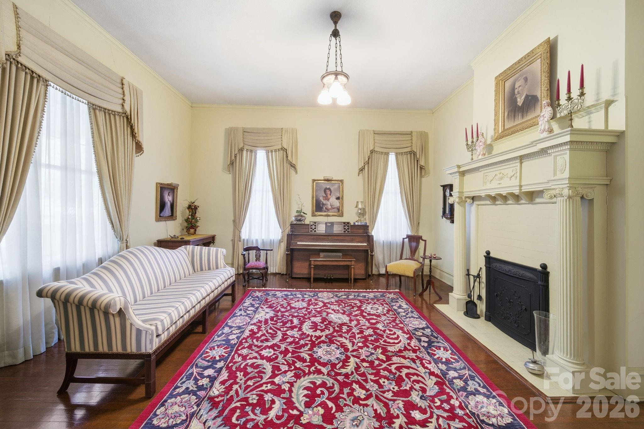 515 Camden Road Wadesboro, NC 28170 - Photo 7 of 36 a living room with furniture and a fireplace