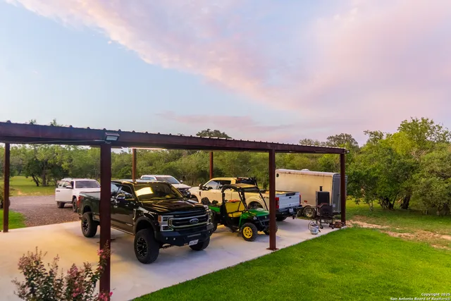 a big yard with lots of trees