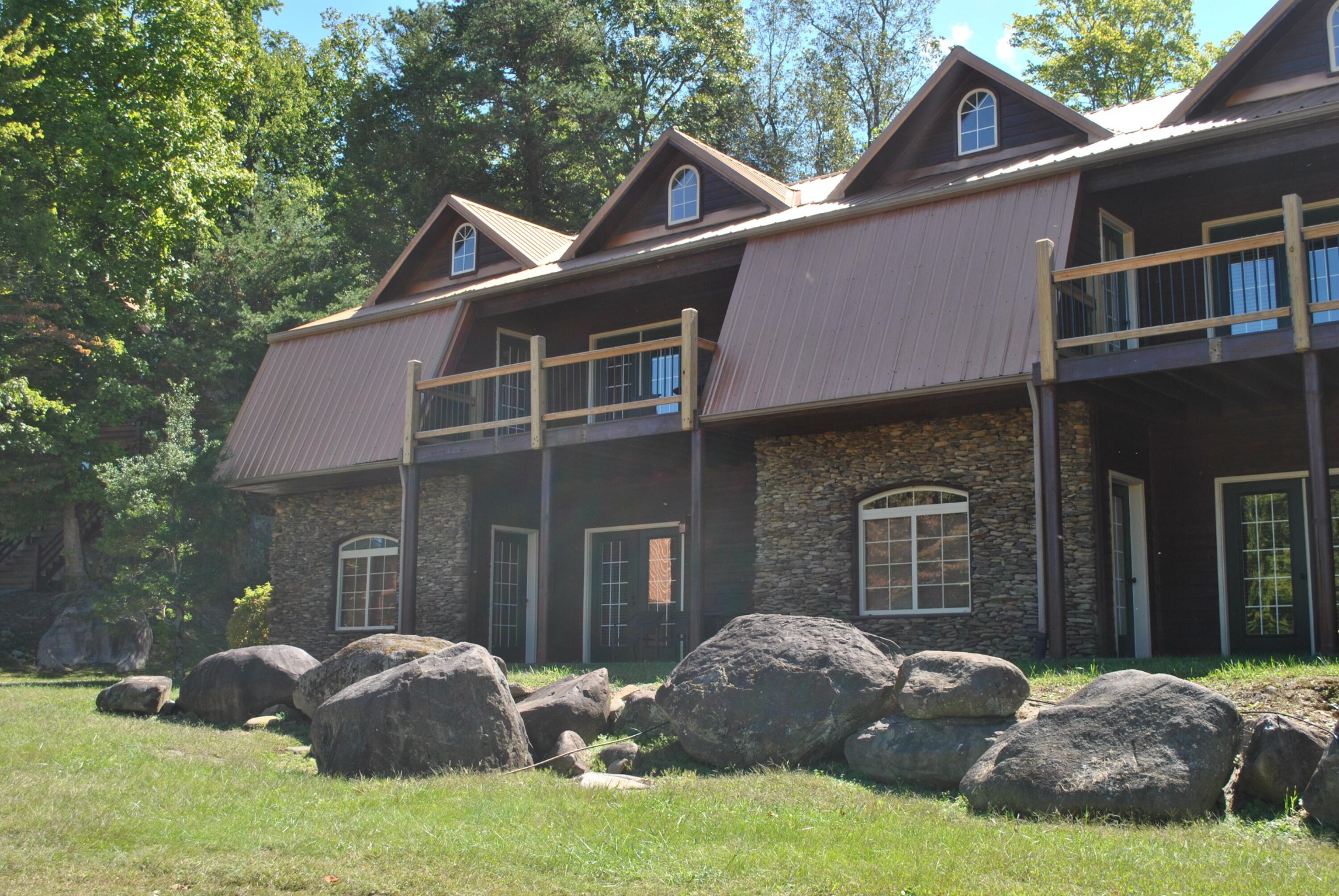 206 Forrest Loop Way, Unit 23 Gatlinburg, TN 37738 - Photo 16 of 16 a front view of a house with a yard