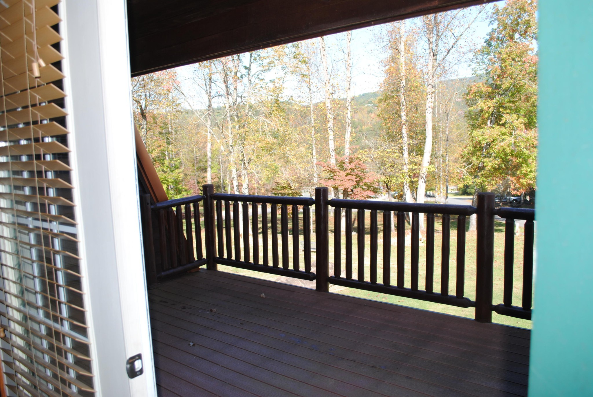 206 Forrest Loop Way, Unit 23 Gatlinburg, TN 37738 - Photo 5 of 16 a view of a room with wooden floor and windows