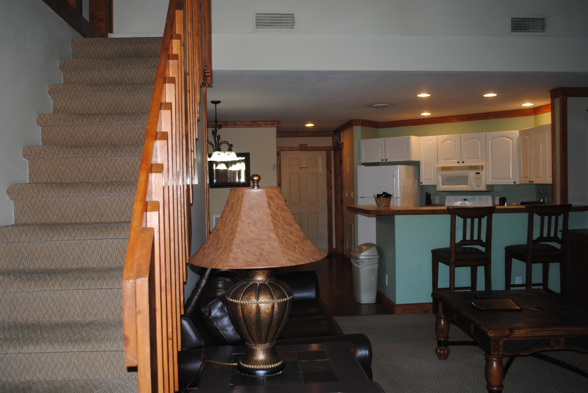 206 Forrest Loop Way, Unit 23 Gatlinburg, TN 37738 - Photo 8 of 16 a view of a kitchen with furniture and a window