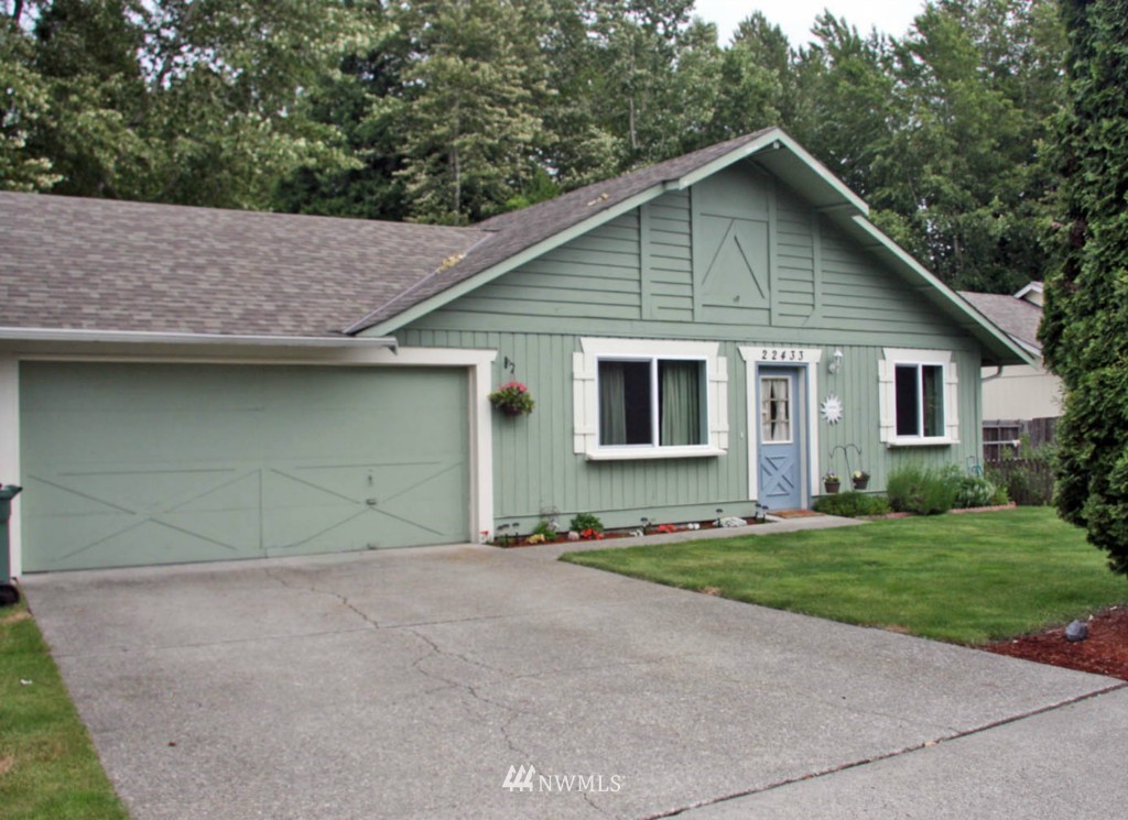 22433 19th Avenue Southeast Bothell, WA 98021 - Photo 1 of 1 a view of a house with a yard