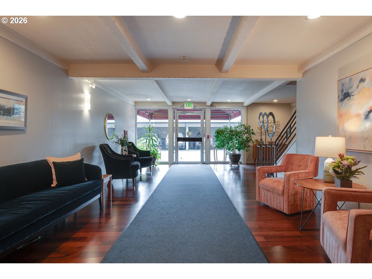 4460 Southwest Scholls Ferry Road, Unit 6A Portland, OR 97225 - Photo 23 of 25 a living room with furniture and a large window