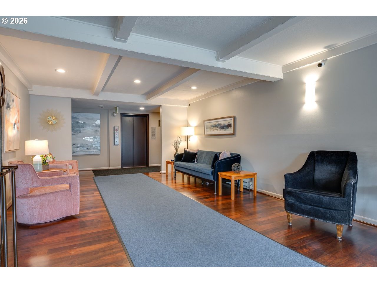 4460 Southwest Scholls Ferry Road, Unit 6A Portland, OR 97225 - Photo 25 of 25 a living room with furniture and a wooden floor