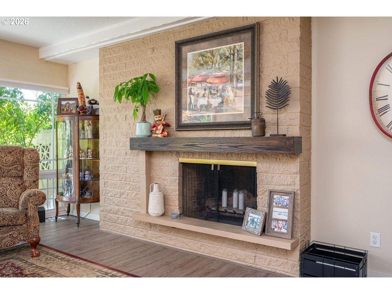 4460 Southwest Scholls Ferry Road, Unit 6A Portland, OR 97225 - Photo 6 of 25 a living room with furniture and a fireplace