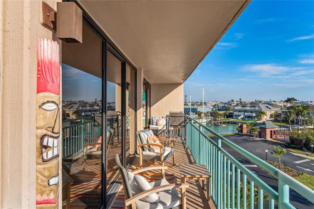 1 Key Capri, Unit 312E Treasure Island, FL 33706 - Photo 14 of 86 a city view from a balcony