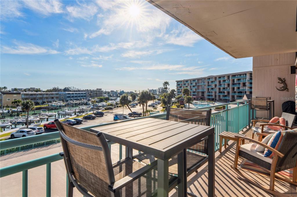 1 Key Capri, Unit 312E Treasure Island, FL 33706 - Photo 15 of 86 a view of a terrace with furniture