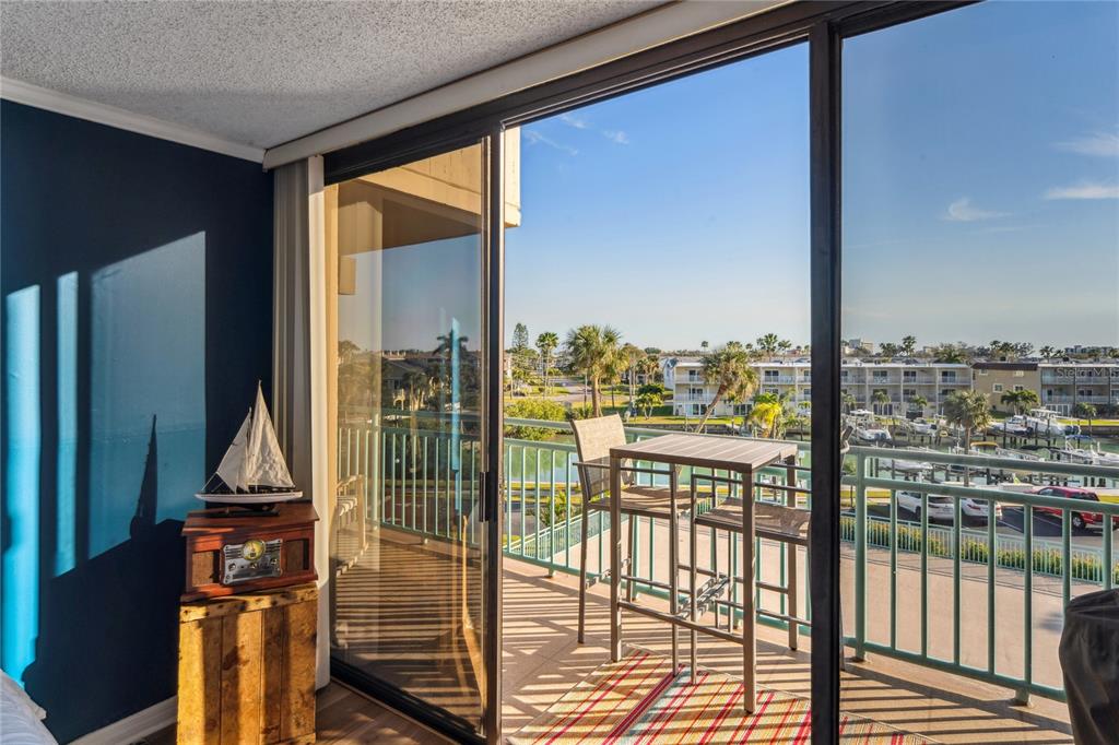 1 Key Capri, Unit 312E Treasure Island, FL 33706 - Photo 33 of 86 a view of a balcony with floor to ceiling window