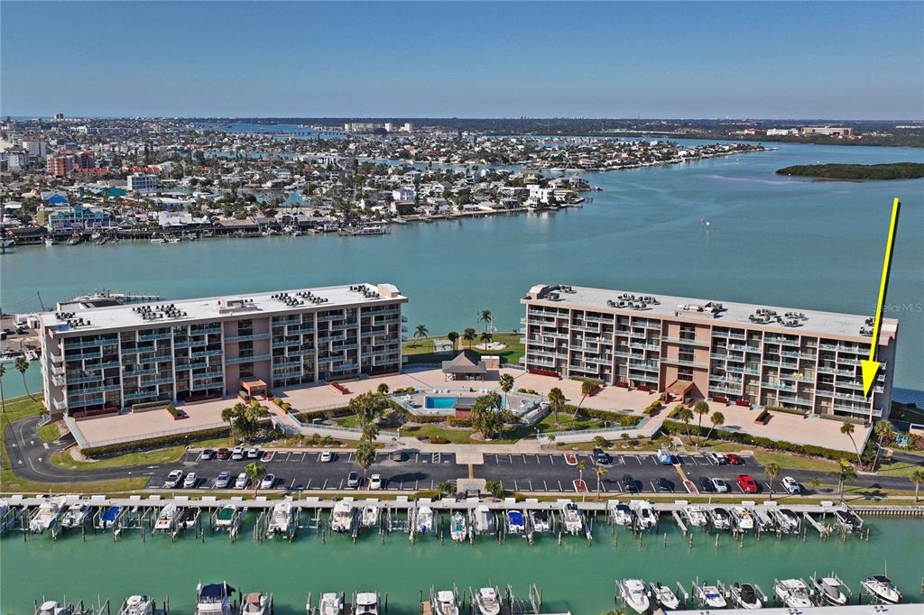 1 Key Capri, Unit 312E Treasure Island, FL 33706 - Photo 43 of 86 an aerial view of a city and lake view