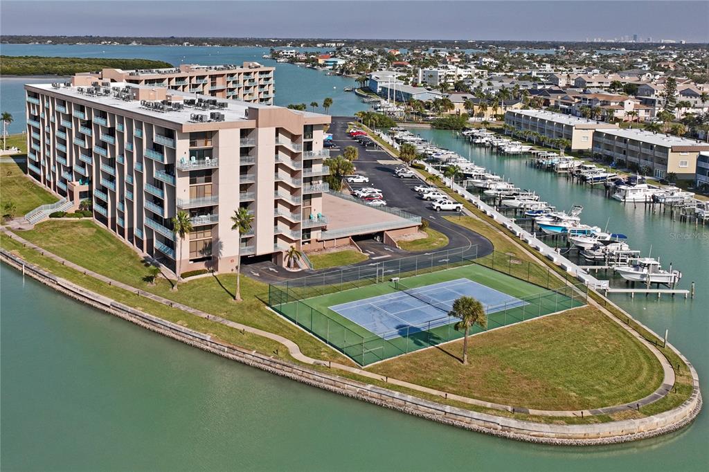 1 Key Capri, Unit 312E Treasure Island, FL 33706 - Photo 46 of 86 an aerial view of a house with a swimming pool