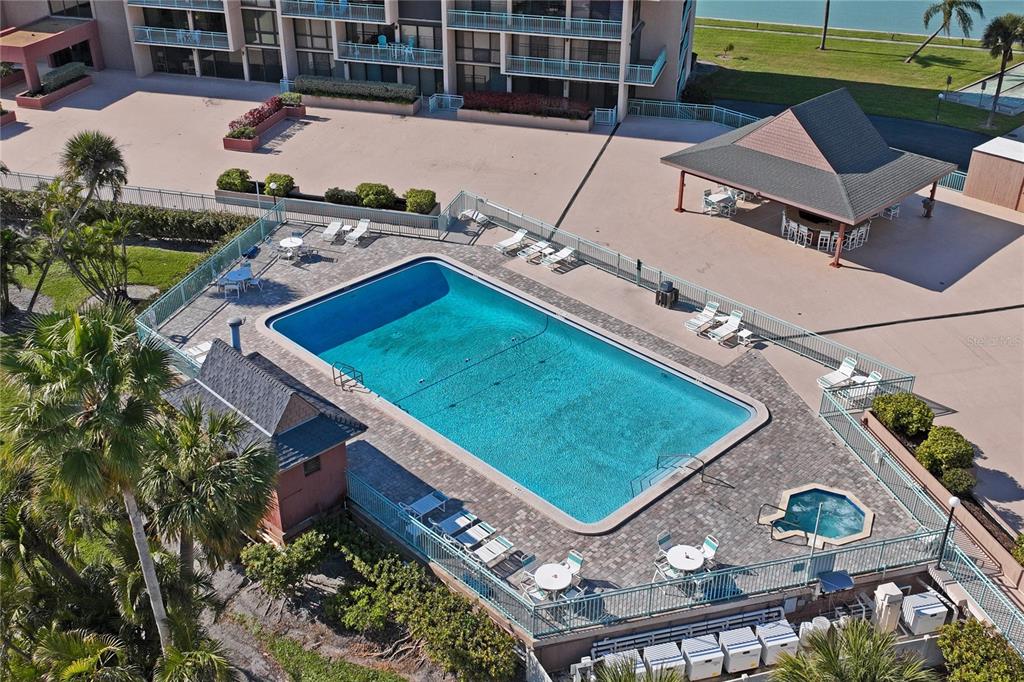 1 Key Capri, Unit 312E Treasure Island, FL 33706 - Photo 66 of 86 an aerial view of a house with a garden and swimming pool
