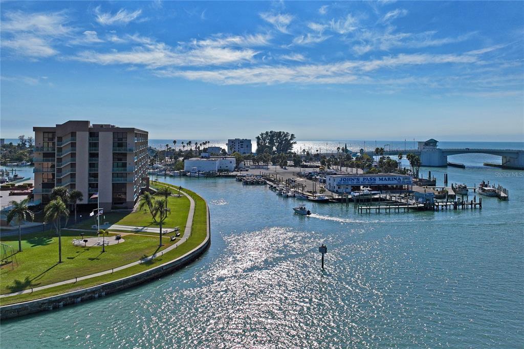 1 Key Capri, Unit 312E Treasure Island, FL 33706 - Photo 71 of 86 a view of a lake with a city