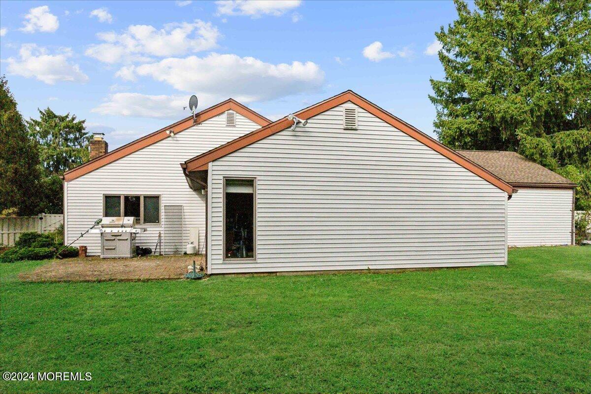 490 Iron Bridge Road Freehold, NJ 07728 - Photo 24 of 40 a view of a house with a backyard