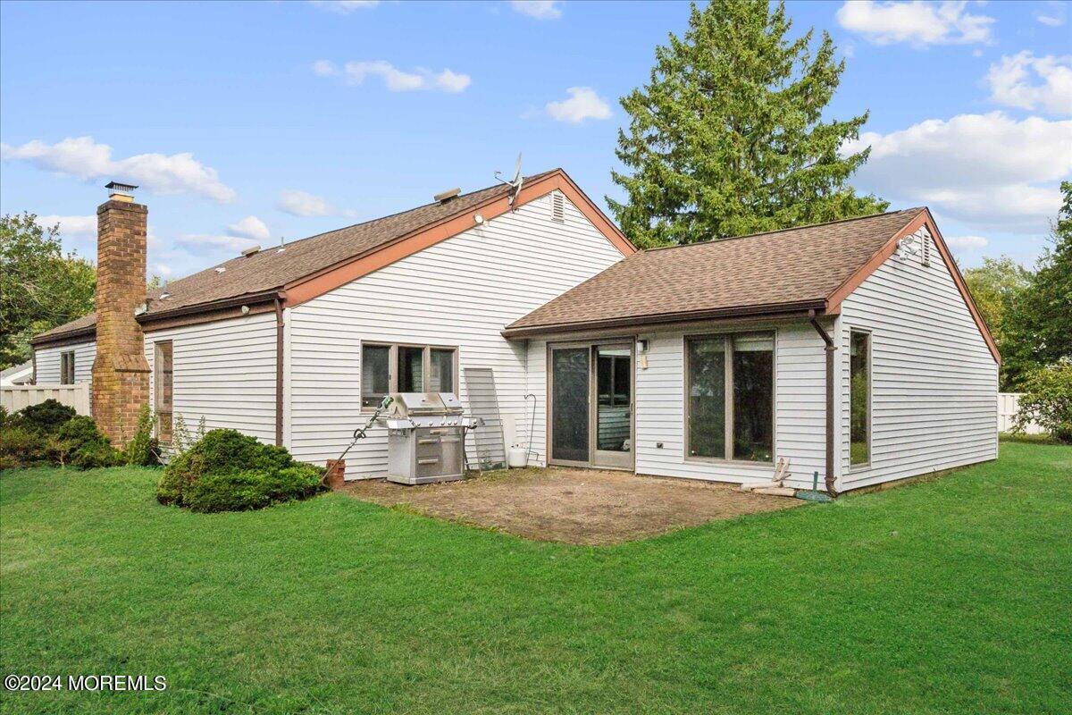 490 Iron Bridge Road Freehold, NJ 07728 - Photo 26 of 40 a front view of house with yard and green space