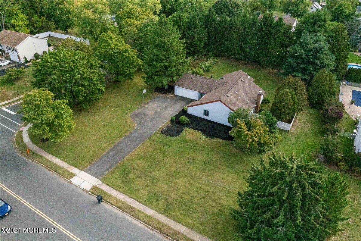 490 Iron Bridge Road Freehold, NJ 07728 - Photo 31 of 40 an aerial view of a golf course with chairs