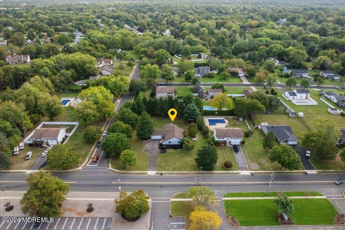 490 Iron Bridge Road Freehold, NJ 07728 - Photo 36 of 40 an aerial view of a house with a garden
