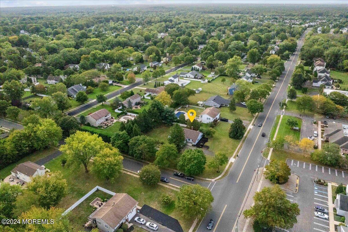 490 Iron Bridge Road Freehold, NJ 07728 - Photo 37 of 40 an aerial view of residential houses with outdoor space and trees