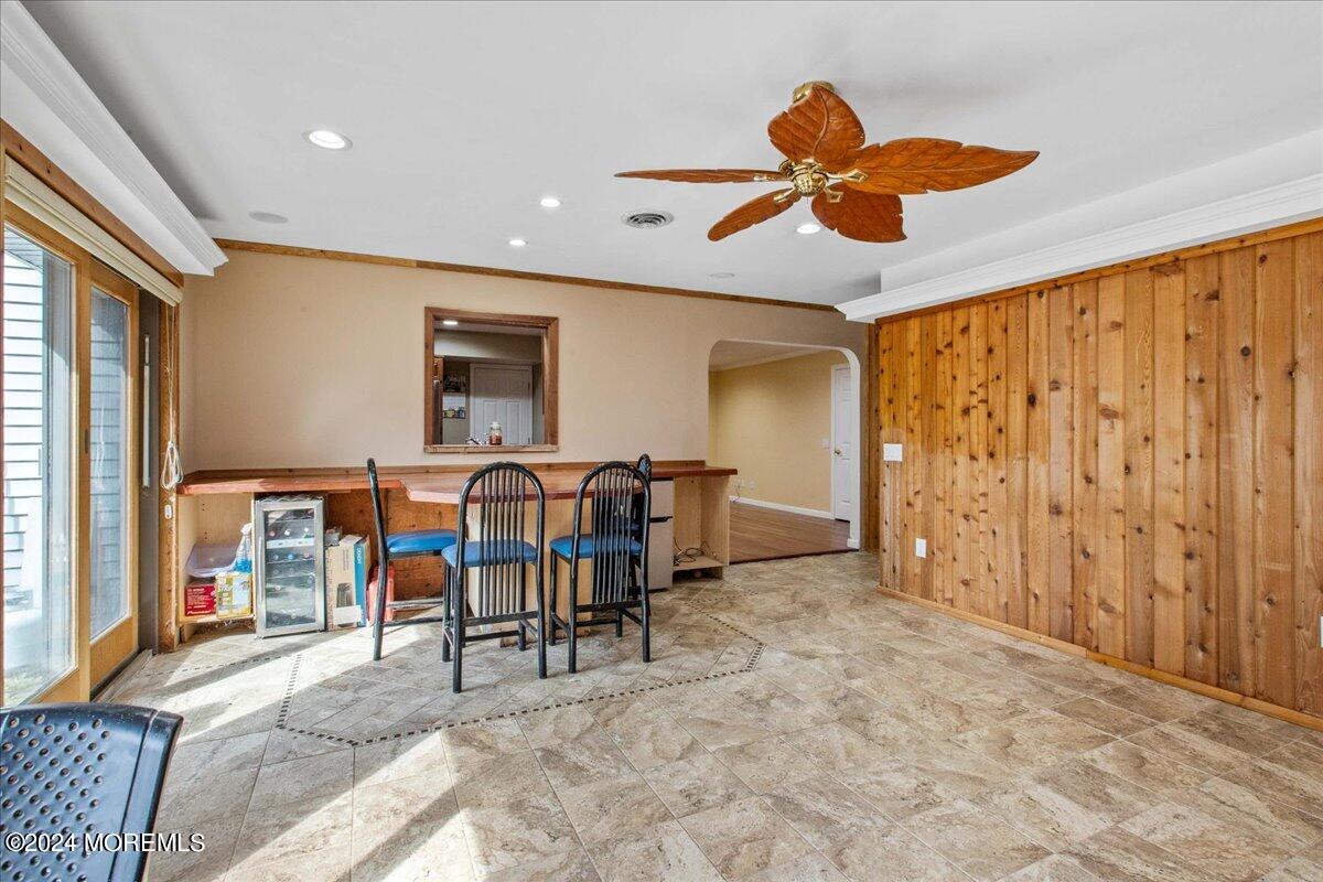 490 Iron Bridge Road Freehold, NJ 07728 - Photo 8 of 40 a view of a dining room with furniture and chandelier