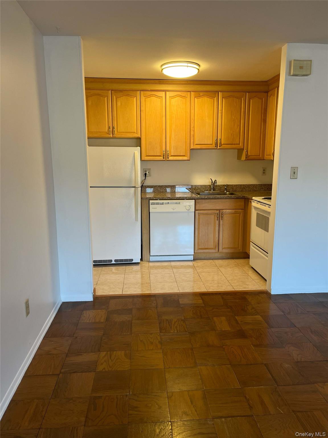 1840 Crompond Road, Unit 9B7 Peekskill, NY 10566 - Photo 5 of 7 a view of a kitchen with a sink