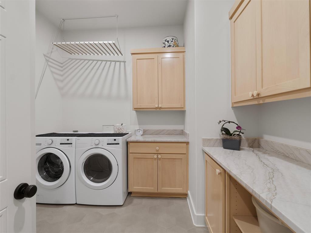 800 John Dean Road Gilmer, TX 75644 - Photo 30 of 40 a utility room with sink dryer and washer