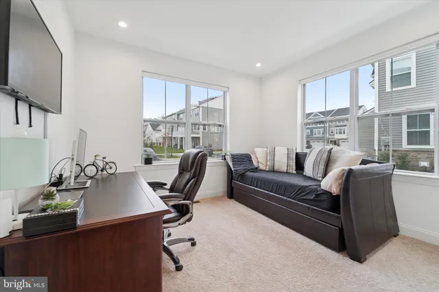 a view of a workspace with furniture