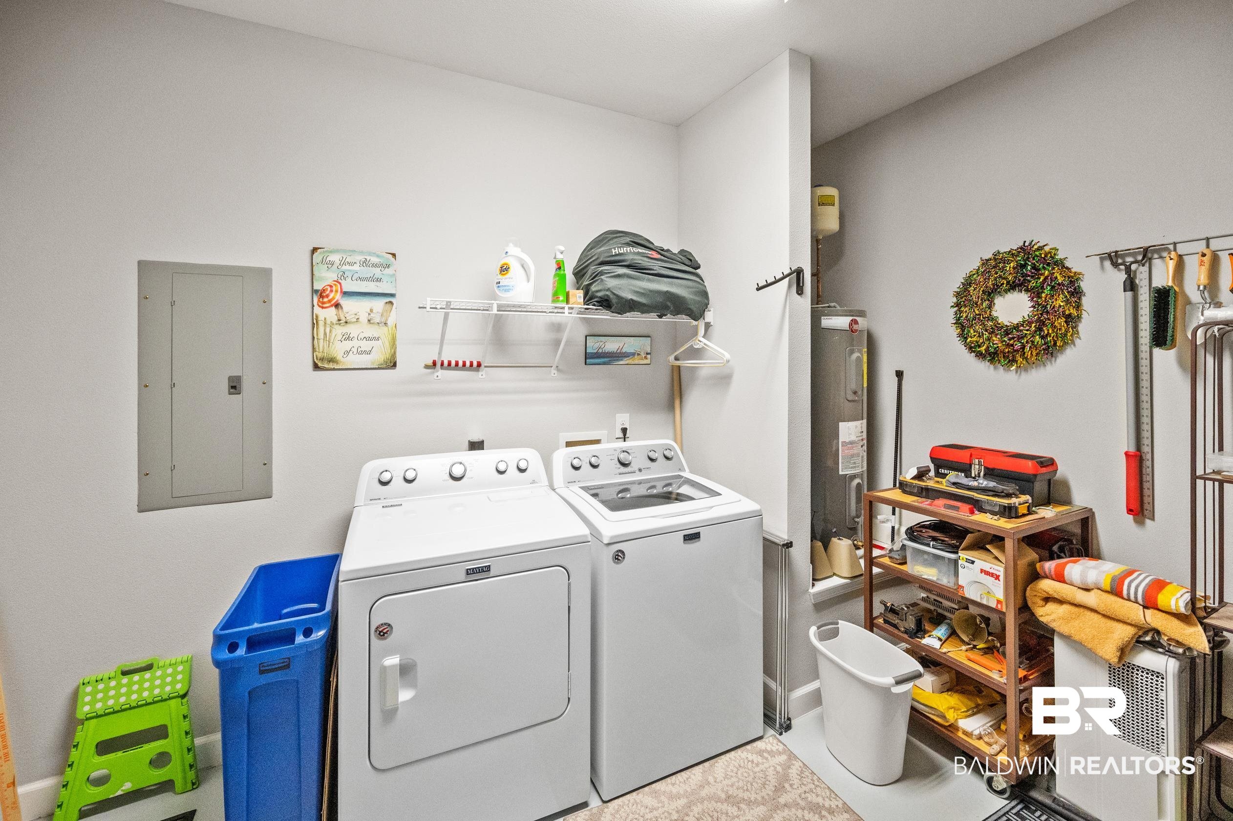 430 West Fort Morgan Road, Unit 1902 Gulf Shores, AL 36542 - Photo 41 of 59 Washroom with electric water heater, washing machine and clothes dryer, and electric panel