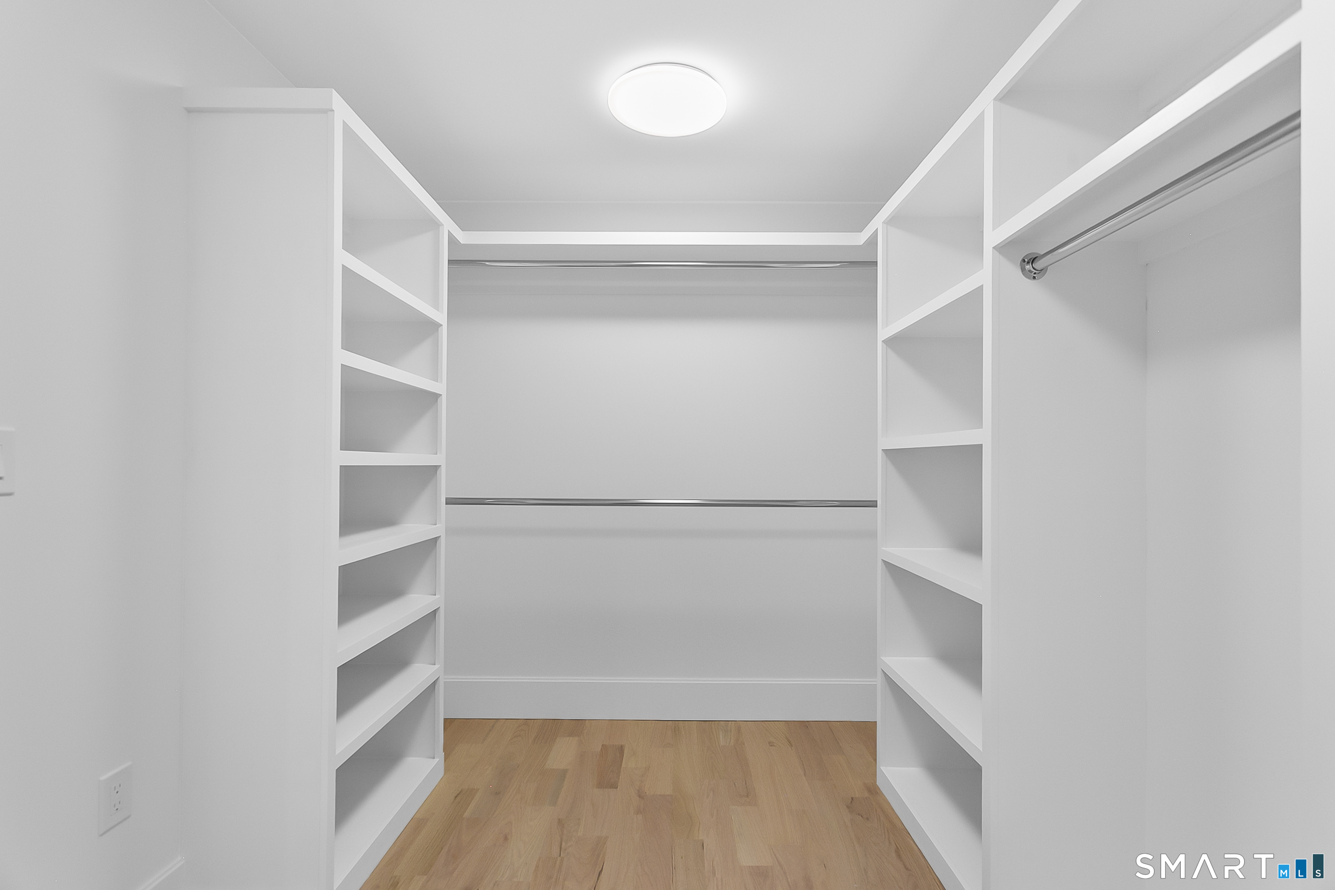 80 Oronoque Hills Road Stratford, CT 06614 - Photo 20 of 31 a view of walk in closet with empty racks