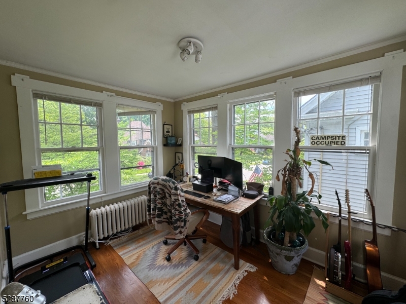 226 Park Street, Unit 2 Montclair, NJ 07042 - Photo 4 of 24 a workspace with furniture and a window