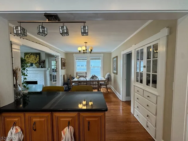 a view of a livingroom with furniture and a window
