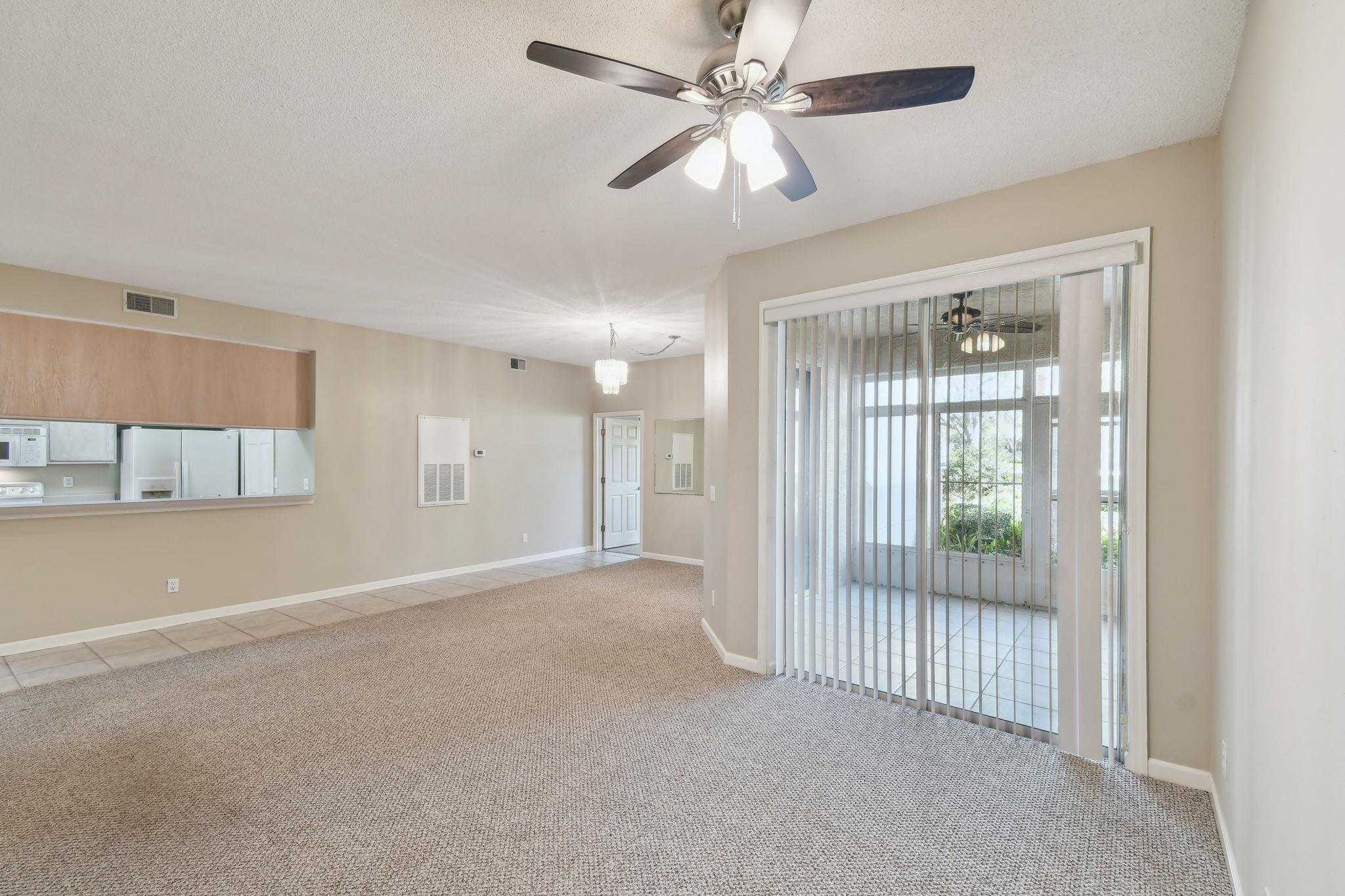 202 Augusta Circle St. Augustine, FL 32086 - Photo 12 of 35 a view of an empty room with a window