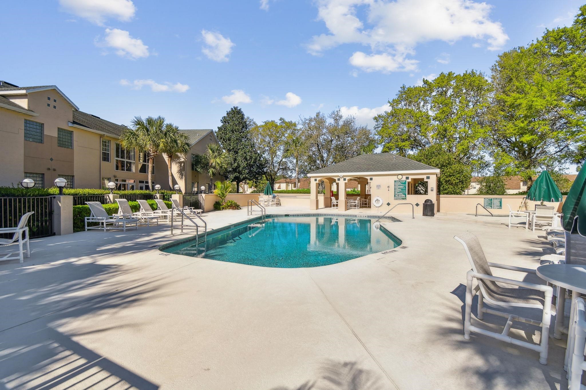 202 Augusta Circle St. Augustine, FL 32086 - Photo 29 of 35 a view of a swimming pool with a patio