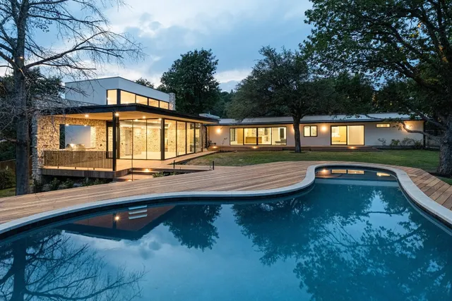 a view of swimming pool with a yard