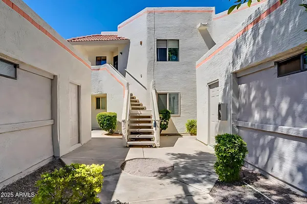 a view of a back yard of the house