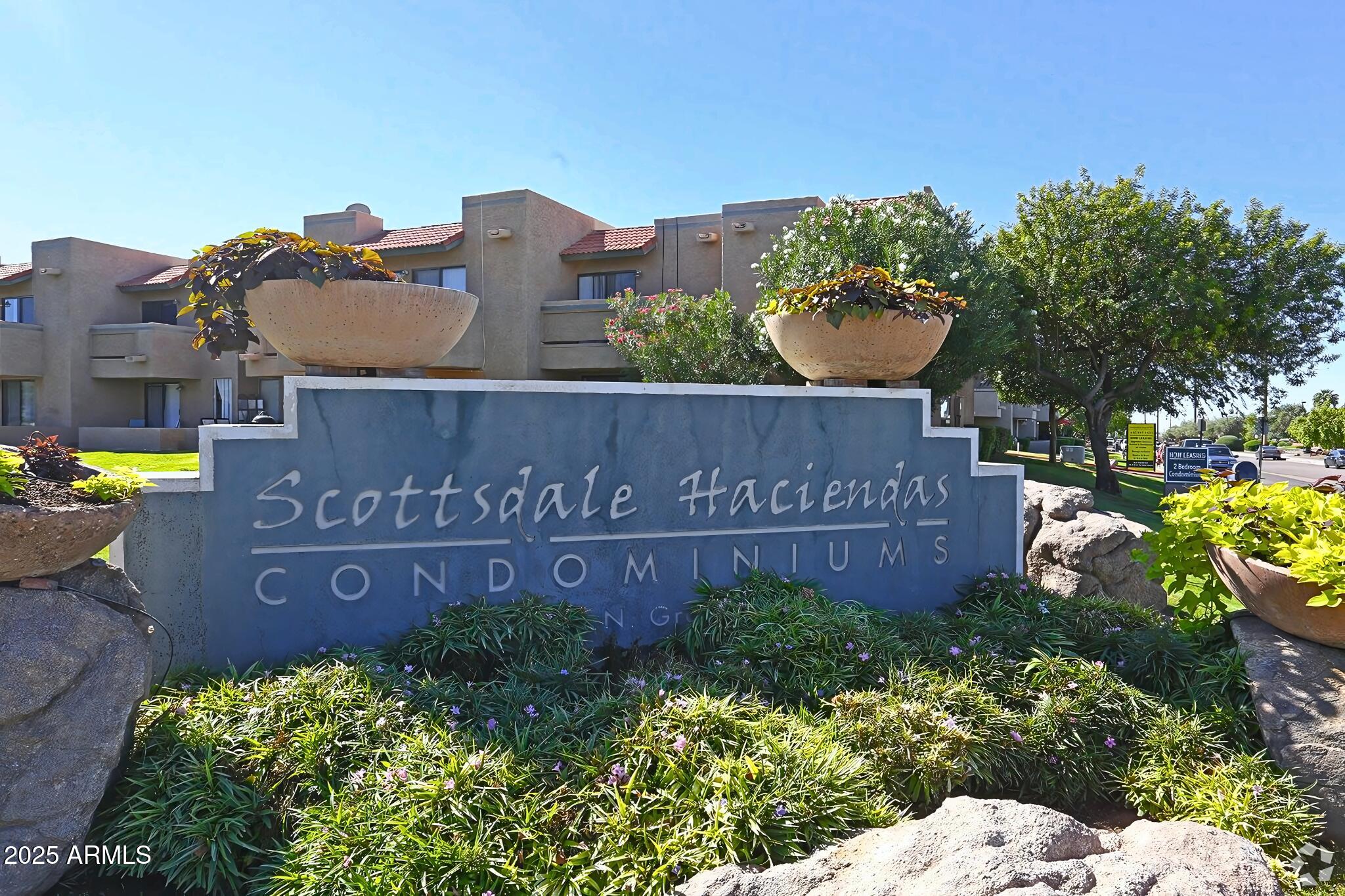 885 North Granite Reef Road, Unit 63 Scottsdale, AZ 85257 - Photo 17 of 23 a sign on the side of the building