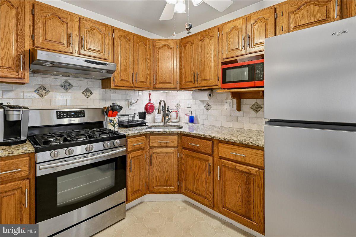 1731 Tacoma Road Edgewater, MD 21037 - Photo 26 of 59 Charming kitchen with modern finishes.