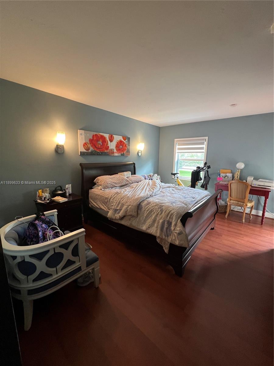 8335 Southwest 72nd Avenue, Unit 212D Miami, FL 33143 - Photo 25 of 31 a bedroom with bed and a window