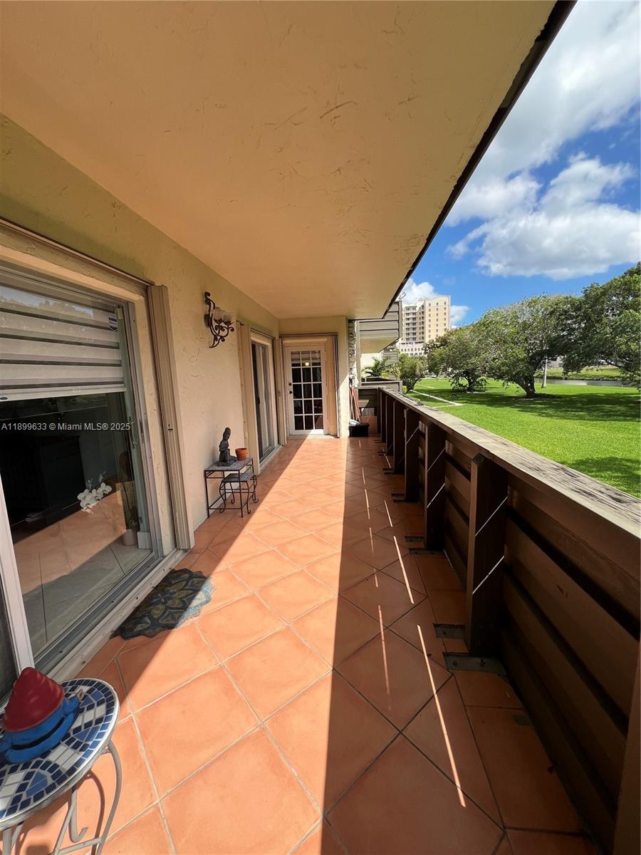 8335 Southwest 72nd Avenue, Unit 212D Miami, FL 33143 - Photo 27 of 31 a view of swimming pool with seating space