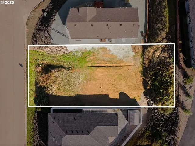 a view of balcony with wooden floor
